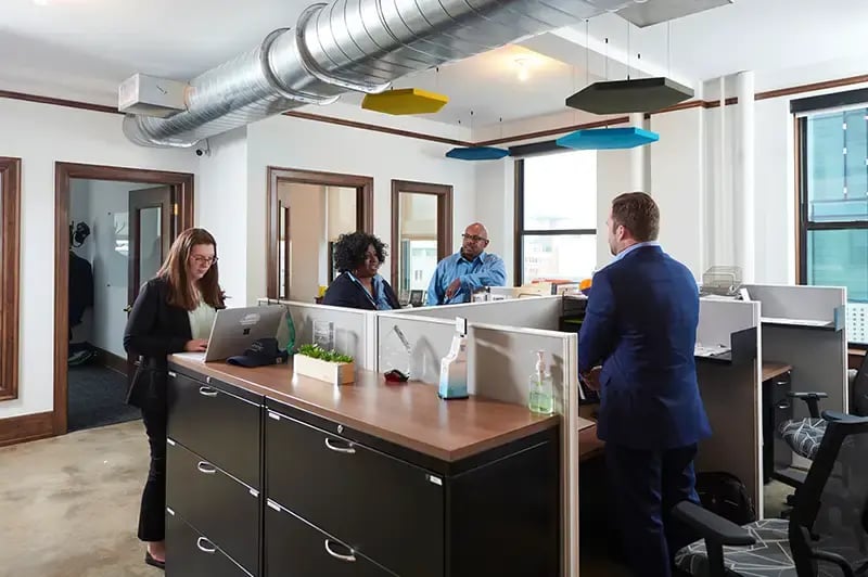 group of people working in an office