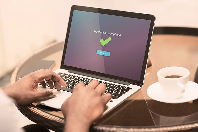 transaction approval on a laptop
