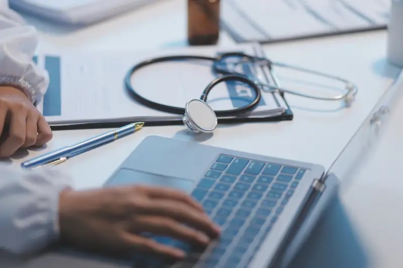 doctor using a computer